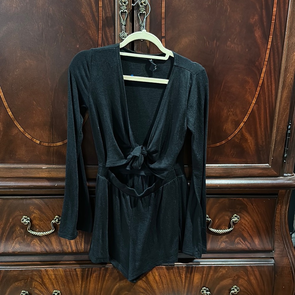 Black romper with tie in front